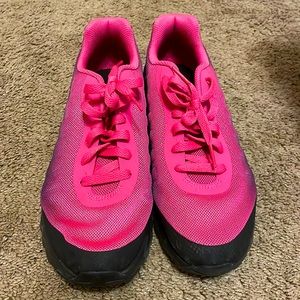 Black and Pink Nike shoes.